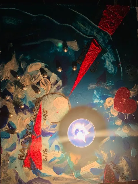 Red Blades Float through the unconscious Body with Candles